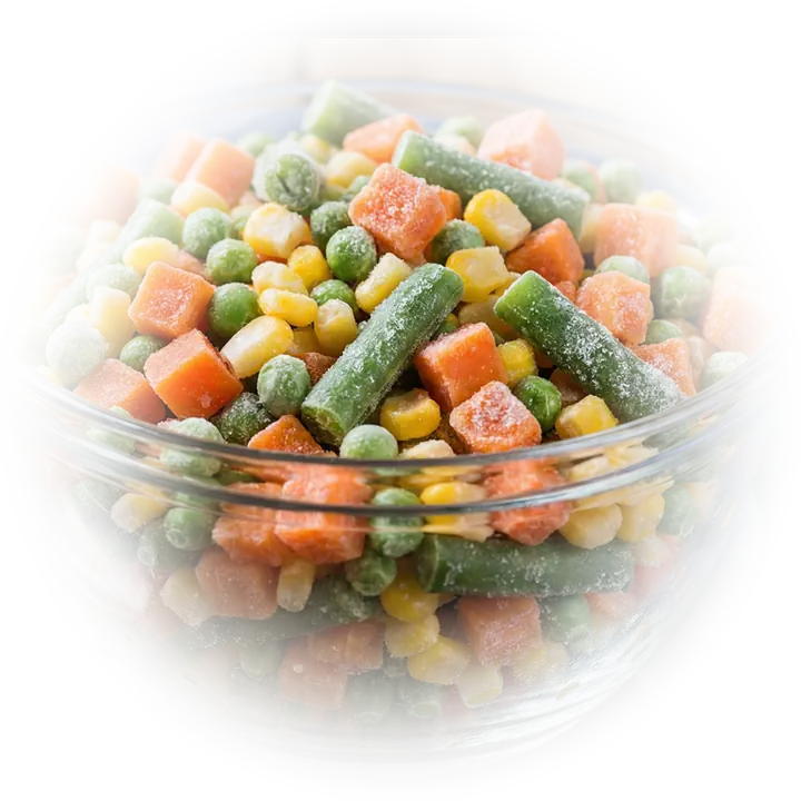 Bowl of frozen mixed vegetables: peas, carrots, sweet corn and beans.