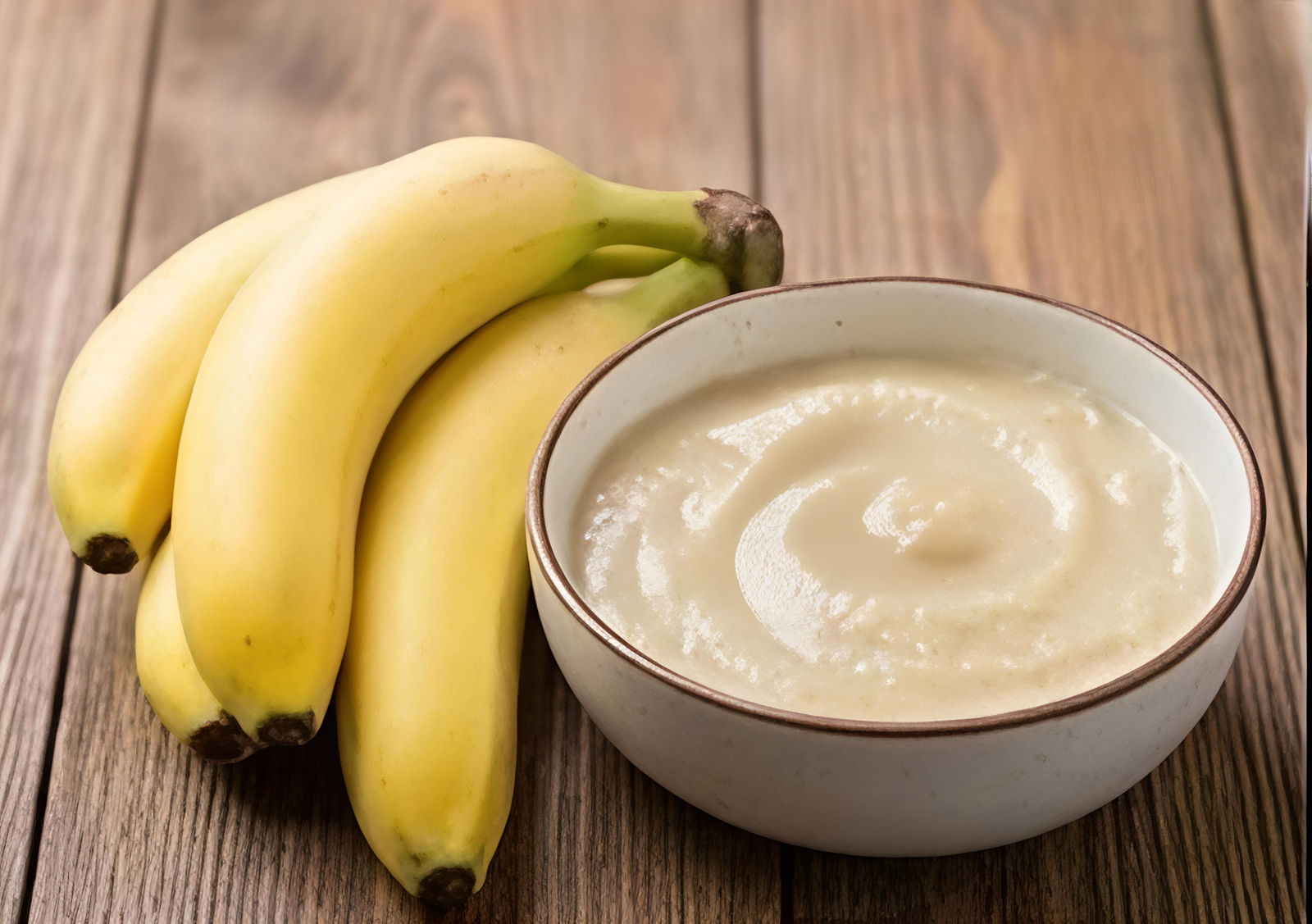 Bowl of banana puree from India with ripe bananas